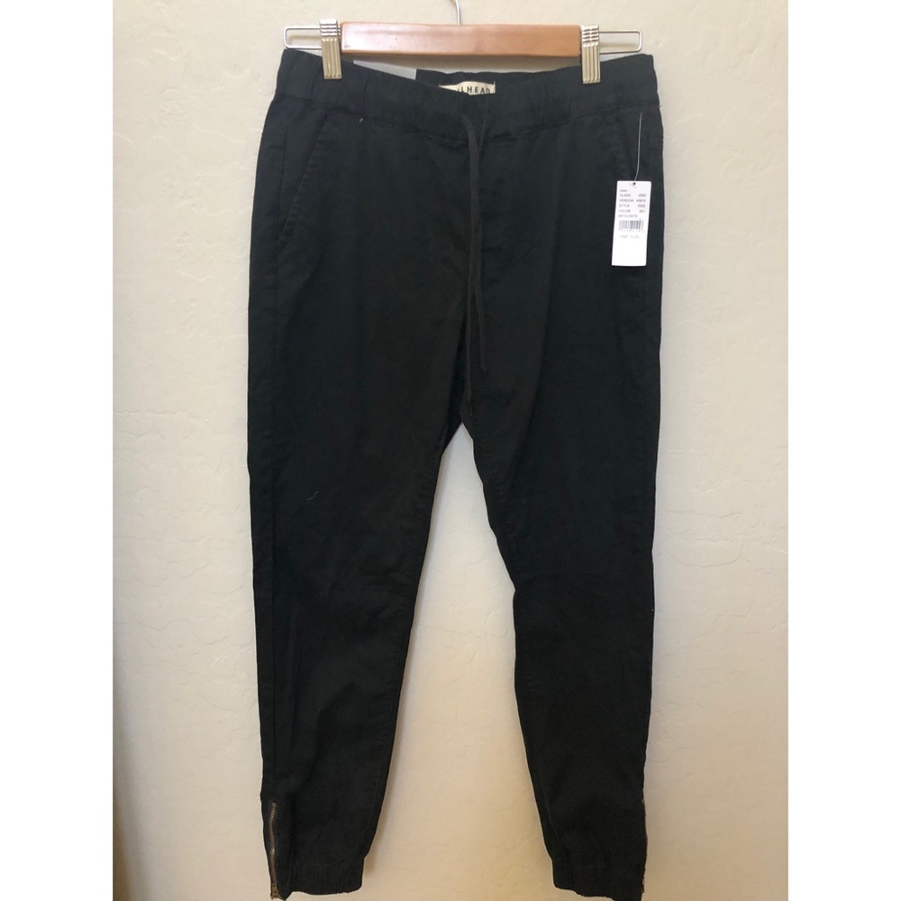 Black Jogger Pants with Zippered ankles.